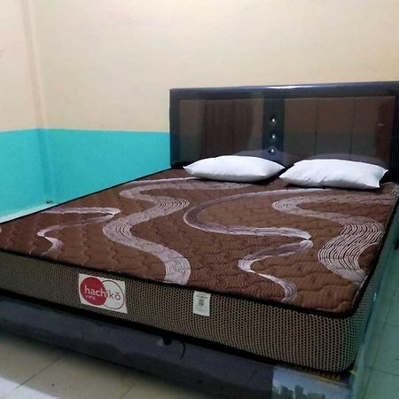 Express O 91938 Grace Kost & Hostel Tiga Binanga ภายนอก รูปภาพ
